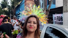 Revellers enjoy the first Sao Paulo Carnival in Brazil since the pandemic began