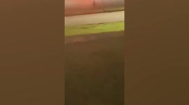 Two injured after bomber plane bursts into flames at Texas Air Force Base