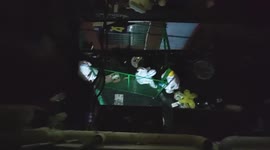 Workers build metal fence to stop residents from leaving apartments in Shanghai, China