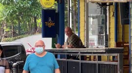 Tourists return to bars as travel restrictions ease in Bangkok, Thailand