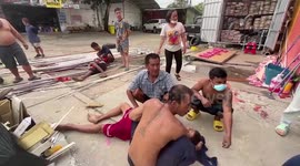 Three injured after 50kg shop sign is blown down by strong winds in Thailand