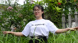 A Falun Dafa practitioners is practicing the 5th exercise of Falun Gong