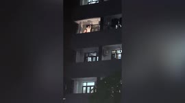 University student entertains locals by dancing on his balcony during lockdown in Shanghai