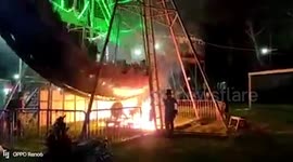 Fairground horror as pirate ship ride catches fire in Indonesia