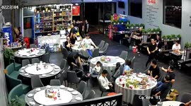 Quick-thinking waiter catches boy falling off chair in Chinese restaurant