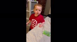 'Curious toddler feels the heat after trying the hot & spicy Atomic FireBall Candy'