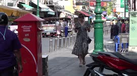 Tourists enjoy hottest day of the year on Khao San Road in Bangkok, Thailand