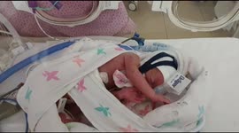 One of Britain's tiniest babies born at 1lb 4oz survived after being placed in a plastic BAG