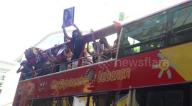 What the...?! Surprising people in Beirut with cheering flash mobs carrying their pictures