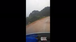 The driver moved the car through the small and narrow pass road
