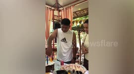 Man receives money cake full of utility bills for his birthday
