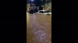 Streets flooded, cars and homes submerged as heavy rains hit Caracas, Venezuela