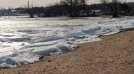 Massive sheets of ice slam Lake Superior shore