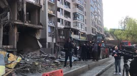 Closeup footage filmed on Friday shows Kyiv apartment block destroyed by Russian strikes