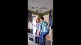 Husband repeatedly tries, and fails, to prank his wife by jumping out at her