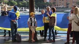 Ukrainians sing at Help Ukraine Now protest