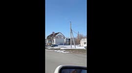 Volunteer drives showing destruction caused by Russian strikes in Kharkiv city