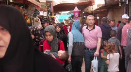 Palestinians shop ahead of Eid al-Fitr holiday, celebrating the end of the holy Muslim fasting month of Ramadan at Al-Zawiya market, one of the most popular destinations for Gaza shoppers