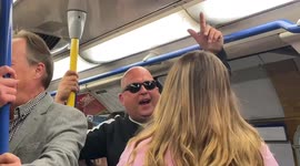 London tube passengers gleefully join in with man singing Oasis' 'Wonderwall'