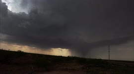 Tornado-warned storm produces ominous funnel cloud above Frankel City in Texas