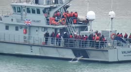 UK Border Force vessels return to Dover after rescuing dozens of migrants in Channel