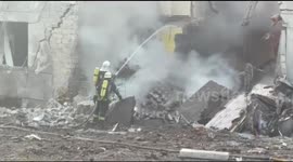 Firefighters battle to extinguish blaze at scene of airstrike that killed teenager in Odesa