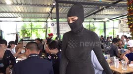 Thai cook wears Kim Kardashian outfit to attract customers to noodle stall