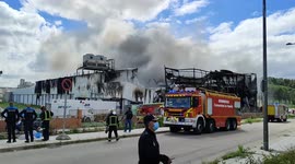 Firefighters battle blaze at meat slaughterhouse in Getafe, Spain