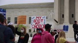 Pro-abortion rights protesters take to Supreme Court steps to protest confirmed Roe leak