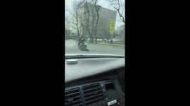 Teen drags traffic officer on moped
