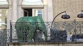 Green elephant sculpture spotted on a balcony in South Kensington  - London