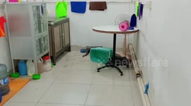 Large monitor lizard caught hiding in kitchen of car showroom in Thailand