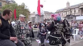 Pearly Kings and Queens enjoy live music at St Georges Day celebrations in Trafalgar Square - London