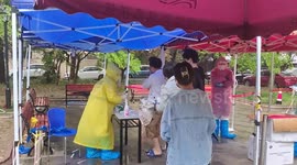 Nucleic Acid Testing In the rain in Shanghai City, China