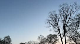 Time-lapse shows changing skies as a line of clouds move in as the moon rises in Pennsylvania