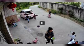 Football kicked by child knocks food out of mother's hands in hilarious footage