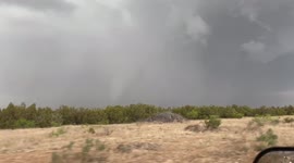 Beautiful white Elephant Trunk tornado about 5mi to my NE near the town of Foard City TX