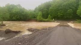 Ash Street in Mountainburg, AR low water bridge flooded