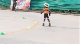A 2 year old toddler skates for 6.5 km (in one hour) in a marathon in South India.