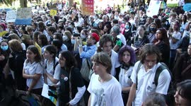 School children take part in the Election #ClimateStrike protest outside the Liberal Party NSW offices at 131 Macquarie Street after marching from Sydney Town Hall
