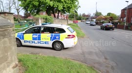 Yorkshire police guard cemetery after a grave was partially dug up