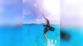 Watch this kitesurfer show off his amazing signature trick - WALKING ON WATER