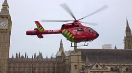 G-LNDN Londons Air Ambulance helicopter taking off in Parliament Square - London