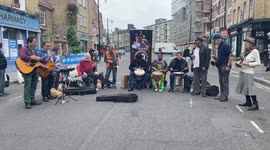 Grand Union Orchestra plays joyful music at Hoxton Street Market