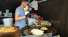Afghans chief cooking a delicious Chinese and Thai Street food at Walthamstow Market, London, UK