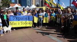 Protesters chant “Ukraine will prevail!” and sing at Sydney rally