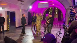 U2's Bono and The Edge perform in Kyiv metro station used as bomb shelter