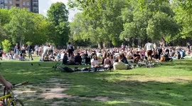People flock to parks with sunny weather in London on Sunday