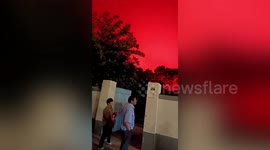 Sky transformed into hellish backdrop due to light refraction caused by boats in China