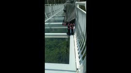 Experience walking on the world's longest glass bridge built on the mountain in Vietnam